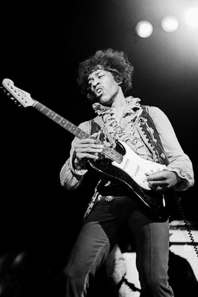 Jimi Hendrix playing a Fender Stratocaster